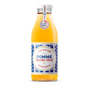 Photo d'une bouteille de jus de fruit, présentée sur un fond blanc. Parfait en accompagnement d'un apéritif.