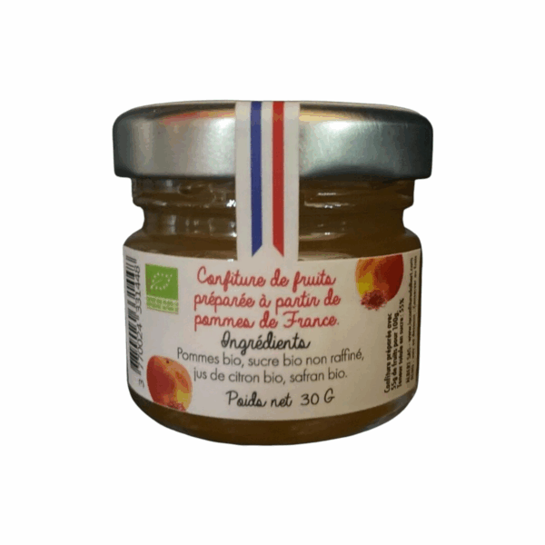 Photo d'une confiture, présentée sur un fond blanc. Parfait en accompagnement d'un bon petit déjeuner.