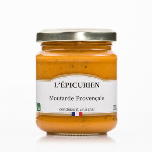 Photo d'une moutarde, présentée sur un fond blanc.