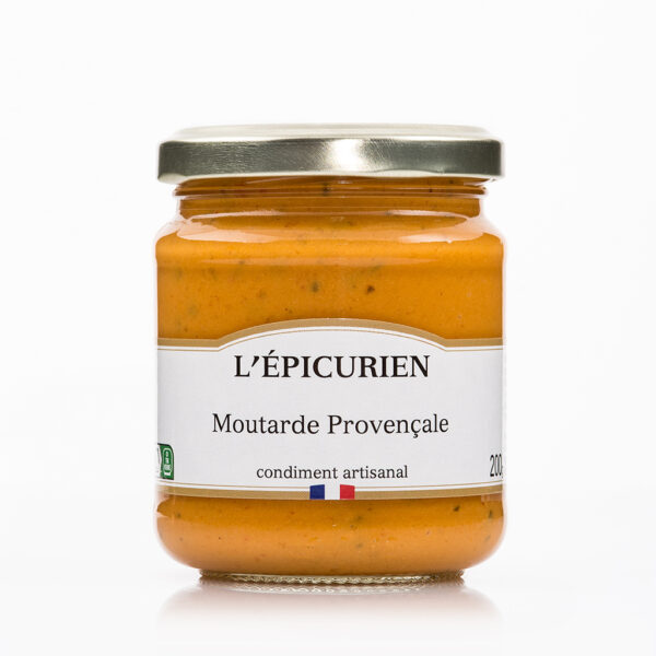 Photo d'une moutarde, présentée sur un fond blanc.