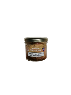 Photo d'une tartinade, présentée sur un fond blanc. Parfait en accompagnement d'un apéritif.