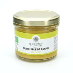 Photo d'une tartinade, présentée sur un fond blanc. Parfait en accompagnement d'un apéritif.