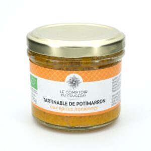 Photo d'une tartinade, présentée sur un fond blanc. Parfait en accompagnement d'un apéritif.