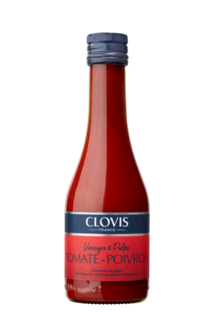 Photo d'un vinaigre, présentée sur un fond blanc. Parfait en accompagnement d'un plat.