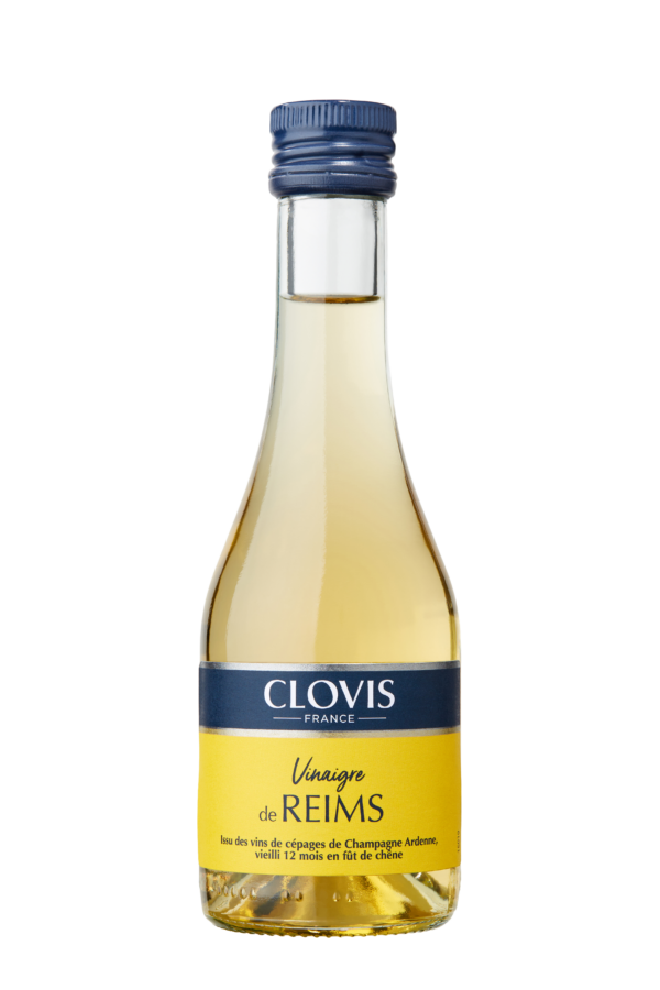 Photo d'un vinaigre, présentée sur un fond blanc. Parfait en accompagnement d'un plat.