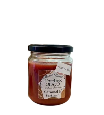 Photo d'un pot de caramel à tartiner, présenté sur un fond blanc.